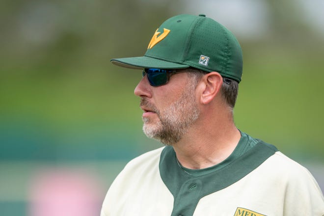 Wayne State head baseball coach Ryan Kelley looks on during the game against Walsh.