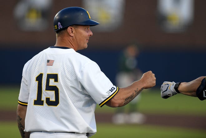 Michigan first base coach and former Detroit Tiger, Brandon Inge, during Michigan's 11-8 win over Michigan State.