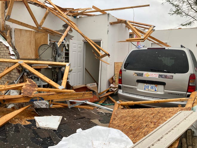 Damage is seen at the home of Betty Wisniewski after a tornado came through Gaylord, Mich., Friday, May 20, 2022. Wisniewski's son said she escaped unharmed.