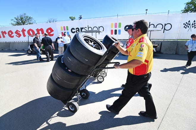 Racing tires are moved into pit lane for the 2022 Chevrolet Detroit Grand Prix on Saturday, June 4, 2022.