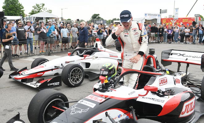 Indy Lights Car 26 driver Linus Lundqvist reacts after he arrives at the winnerâ€™s circle at the Chevrolet Detroit Grand Prix on Belle Isle in Detroit on June 5, 2022.   
(Robin Buckson / The Detroit News)