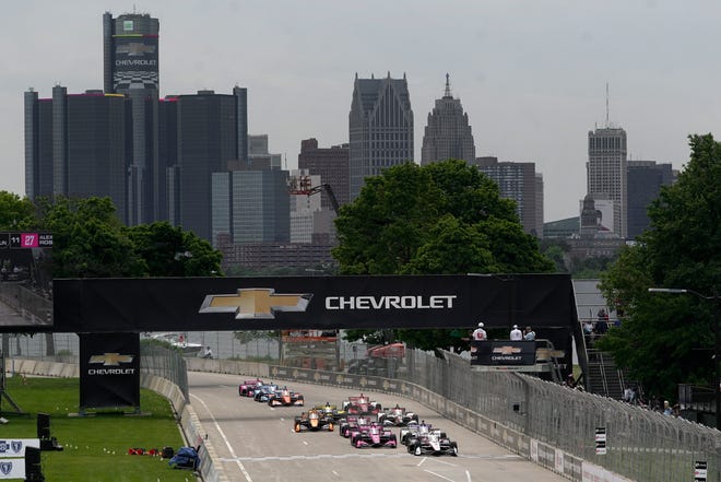 Josef Newgarden (2) leads the field into the start of the IndyCar Detroit Grand Prix auto race on Belle Isle in Detroit, Sunday.