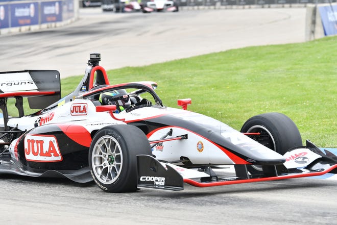 Indy Lights Car 26 driver Linus Lundqvist runs and stays in first place for the win at the Chevrolet Detroit Grand Prix on Belle Isle in Detroit on June 5, 2022.   
(Robin Buckson / The Detroit News)