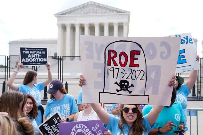 Demonstrators protest about abortion outside the Supreme Court in Washington, Friday, June 24, 2022.