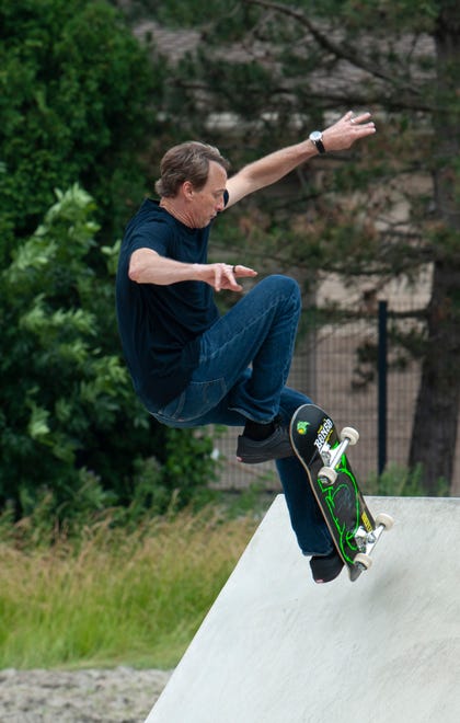 Legendary skateboarder Tony Hawk does a few casual skateboard tricks while riding the new Chandler Park Skatepark in Detroit.