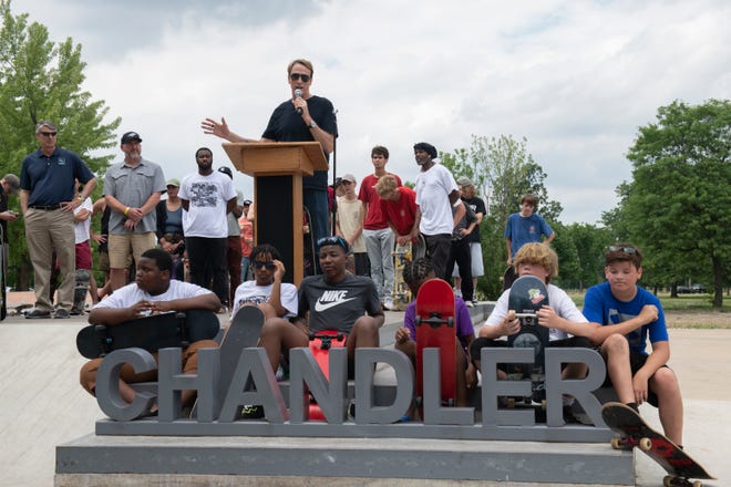 Legendary skateboarder Tony Hawk gives a speech during the grand opening of the new Chandler Park Skatepark in Detroit on Sunday, June 26, 2022.