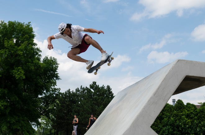 Skater Jordan Zuppke of Royal Oak catches some air during the grand opening of the new Chandler Park Skatepark in Detroit.