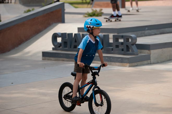A young BMX rider navigates the new Chandler Park Skatepark in Detroit.