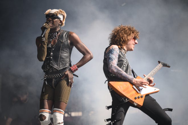 US musician Yves Tumor (L) performs with guitarist Chris Greatti on the West Holts Stage during day four of Glastonbury Festival on June 25, 2022.