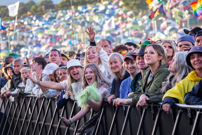 Festival goers watch Sam Fender perform at the Glastonbury Festival on June 24, 2022.