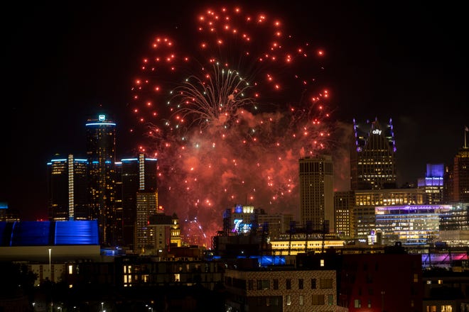 Colors shoot across the Detroit skyline during the annual fireworks show over the Detroit River, June 27, 2022.