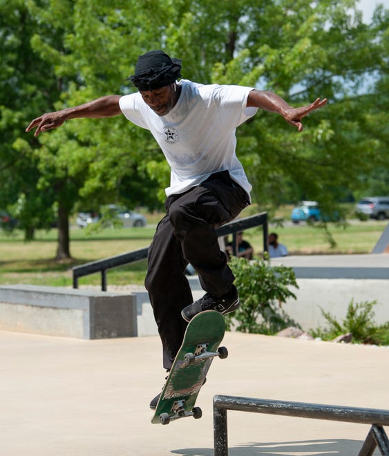 A skateboarder calling himself Mr. Premium shreds on the skate course at the new Chandler Park Skatepark in Detroit.
