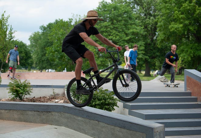 Joe Gall of Berkley rides his BMX bike on the skate course at the new Chandler Park Skatepark in Detroit.