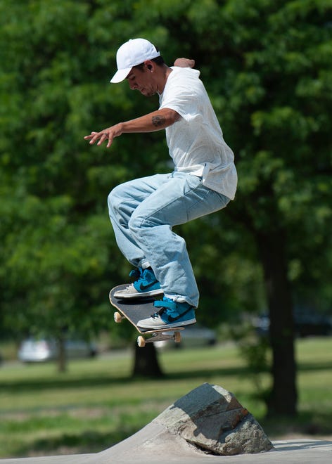 Skateboarder Cris Gomez-Mora, 25, of Goshen, Indiana skates at the new Chandler Park Skatepark.