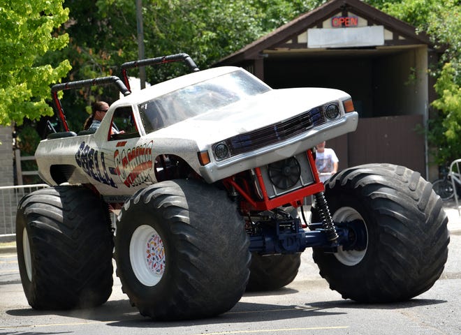 Ron Kujat, of Plymouth, drives his Shell-Camino monster-ride truck, Saturday afternoon, July 2, 2022. This truck and the racing truck his wife, Shelley, (neither pictured) drives were featured in the Netflix original movie, "Little Evil." The monster-ride truck has a 472-cubic-inch, 8.1-liter gas engine and holds eight to 10 people, enough for a family to ride together.