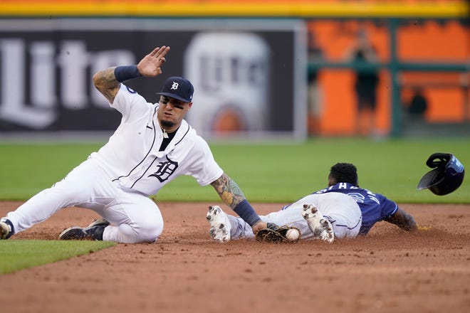 Tigers shortstop Javier Baez tags Tampa Bay Rays' Randy Arozarena for the out on the attempted steal during the second inning.
