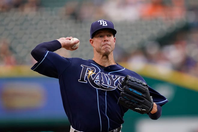 Rays starting pitcher Corey Kluber throws during the first inning.