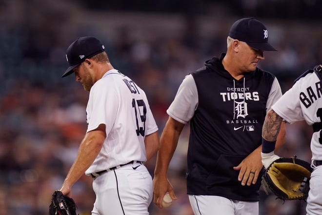 Tigers relief pitcher Will Vest is relieved by manager A.J. Hinch during the fifth inning.