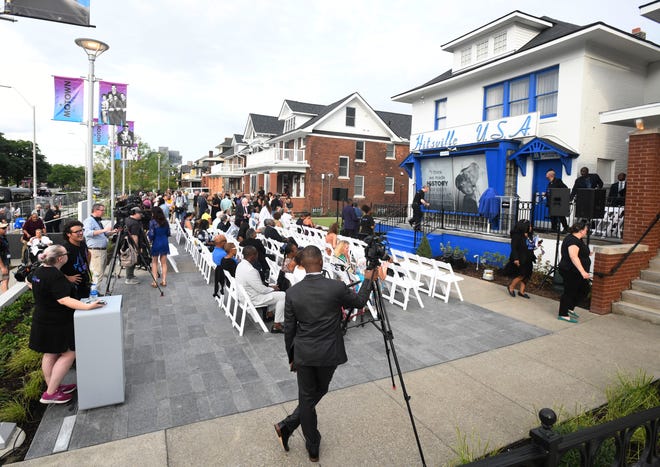 People gather on the new front porch of the Motown Museum expansion project.