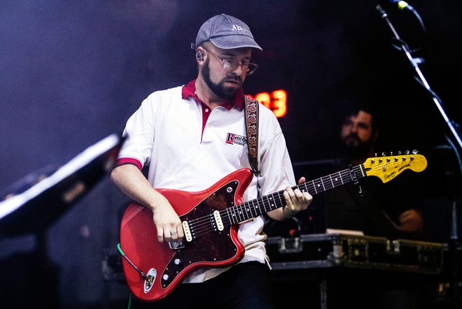 Guitarist Ian MacDougall performs with Band of Horses at Pine Knob.