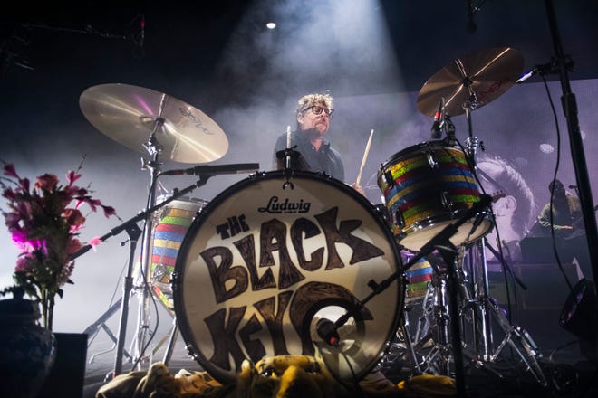 Patrick Carney, drummer for The Black Keys, performs during the band’s Dropout Boogie Tour at Pine Knob.