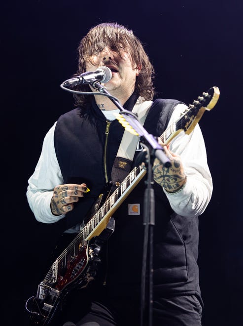 Frank Iero, rhythm guitarist for the band My Chemical Romance, performs.