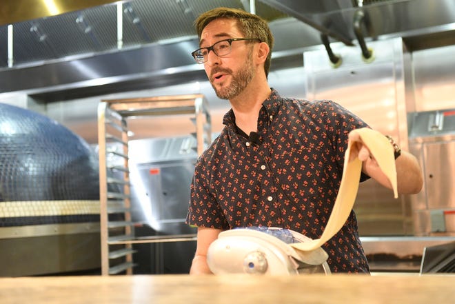 Supergeil executive chef Brendan McCall talks about flattening the dumpling dough at Dish and Design Cozy Comfort event at  Great Lakes Culinary Center in Southfield, Mich. on Sept. 20, 2022.