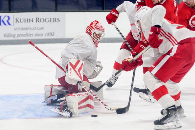 Goaltender Ville Husso keeps his eye on the puck during the Red Wings’ training camp at Centre Ice Arena.