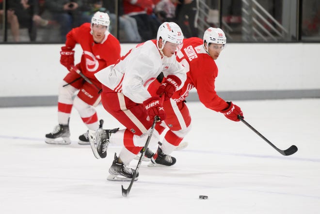 Left wing Lucas Raymond moves the puck down the ice during the Red Wings’ training camp at Centre Ice Arena.