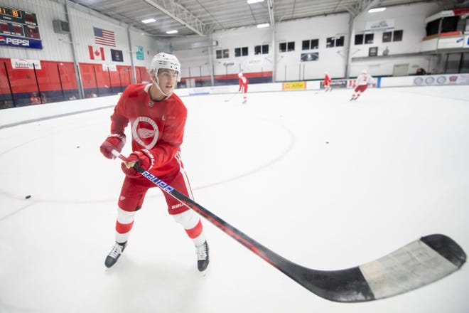 Defenseman Simon Edvinsson passes the puck during the Red Wings’ training camp at Centre Ice Arena.