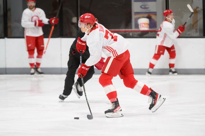 Right wing Cross Hanas shoots the puck during the Red Wings’ training camp at Centre Ice Arena.