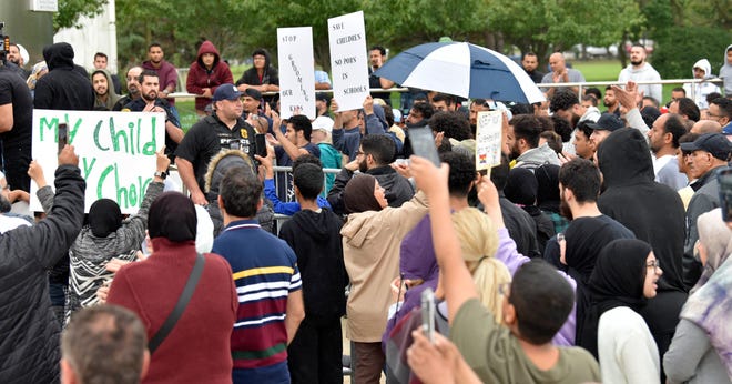 Approximately 800 people attend the Rally To Protect Our Children in front of the Henry Ford Centennial Library in Dearborn, Sunday afternoon, September 25, 2022, as they want books with sexually explicit material to be taken out of school libraries.