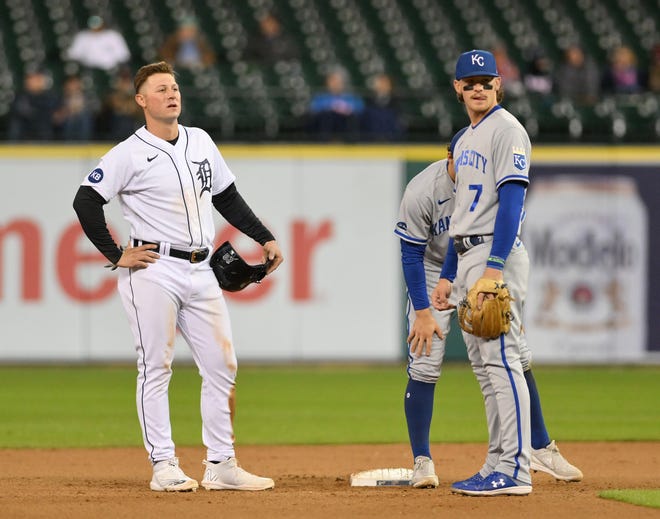 From left, Tigers' Spencer Torkelson and Royals shortstop Bobby Witt Jr. (7) wait while the out call at second base is reviewed due to a Detroit challenge in the eighth inning.
