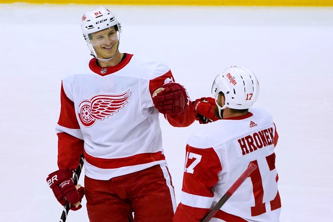 Detroit Red Wings' Dominik Kubalik, left, celebrates with Filip Hronek (17) after scoring against the Pittsburgh Penguins during the first period of a preseason game on Tuesday, Sept. 27, 2022.