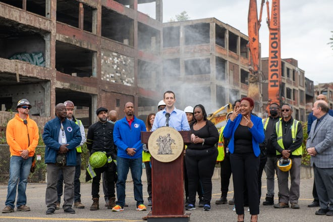 Mike McConnell, president of AVL Creative, speaks during a press conference before the demolition of one building of the former Packard plant, in Detroit, September 29, 2022.