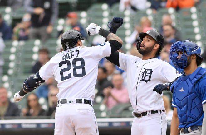 From left, Tigers' Javier Báez reacts with Riley Greene after Báez hit a two-run home run in the fifth inning.