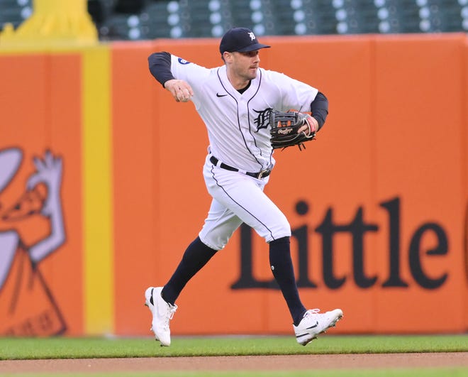 Tigers second baseman Ryan Kreidler fields a ground ball and prepares to throw to first in the first inning against the  Kansas City Royals at Comerica Park in Detroit on Sept. 28, 2022.