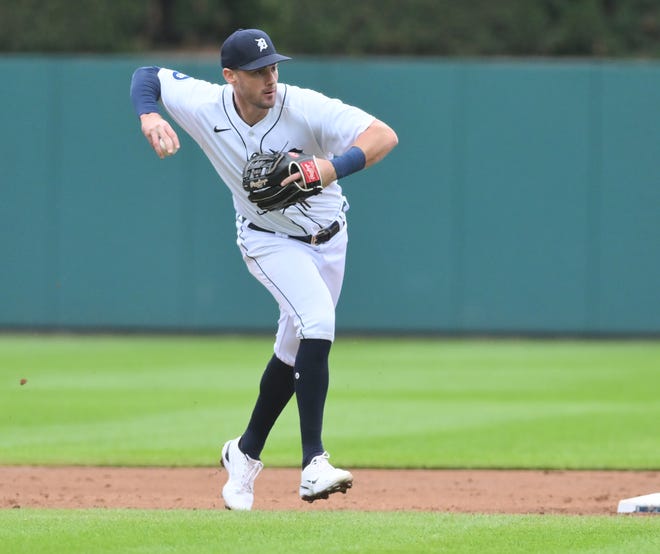 Tigers shortstop Ryan Kreidler makes a running throw to first base in the second inning.