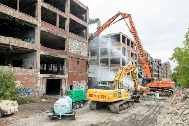 Demolition equipment begins work on tearing down one building of the former Packard plant, in Detroit, September 29, 2022.