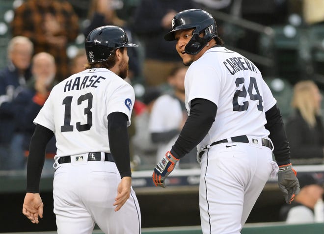 Detroit Tigers’ Eric Haase (13) and Miguel Cabrera react after they both score on Cabrera’s home run in the first inning against the  Kansas City Royals at Comerica Park in Detroit on Sept. 28, 2022.
