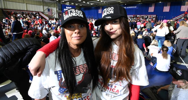 Jamie Barnes, left, and her daughter, Rya Wagner, both of Flint, pose at a Donald Trump rally in Warren, Saturday, October 1, 2022.