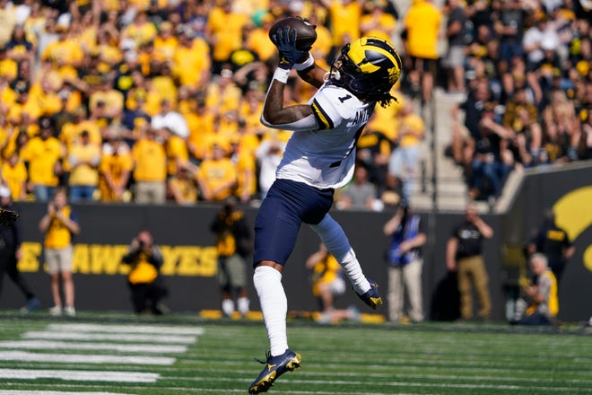 Michigan wide receiver Andrel Anthony (1) catches a pass during the first half.