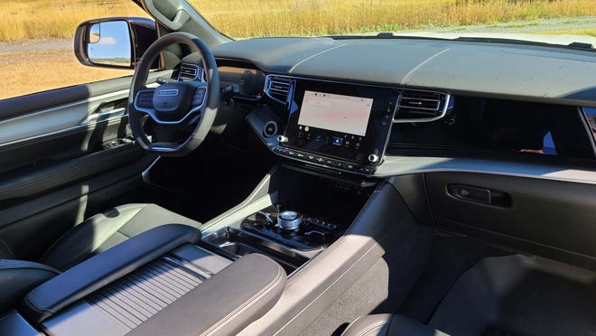 The palatial interior of the 2023 Jeep Wagoneer L can hold up to five screens.