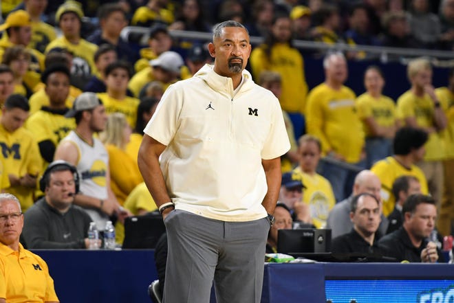 Michigan head coach Juwan Howard watches his team play against Jackson State in the first half of an NCAA college basketball game, Wednesday, Nov. 23, 2022, in Ann Arbor, Mich. (AP Photo/Jose Juarez)