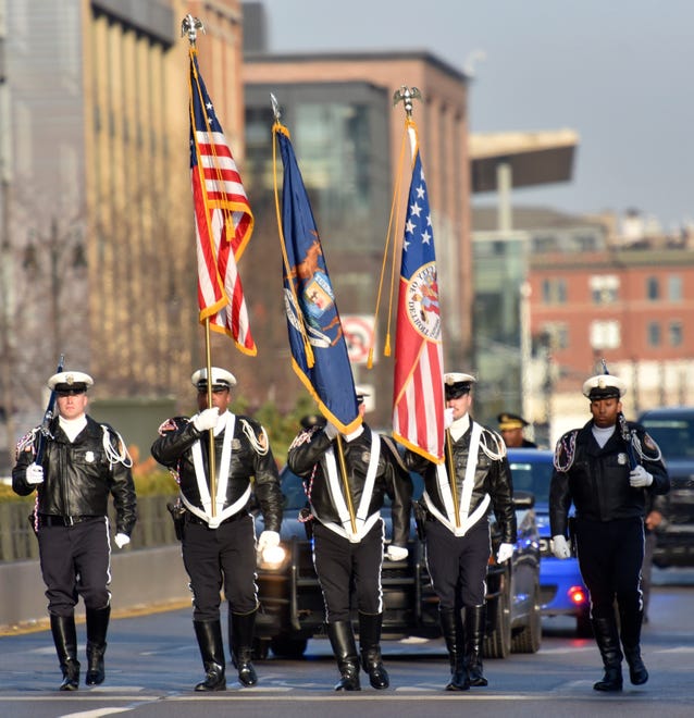 The Detroit Police Honor Guard begins the 96th America's Thanksgiving Parade presented by Gardner White, Thursday morning, November 24, 2022.