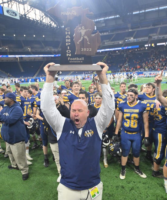 Ottawa Lake Whiteford coach Todd Thieken celebrates the 26-20 division 8 MHSAA Championship over Ubly at Ford Field in Detroit, Michigan on November 25, 2022.