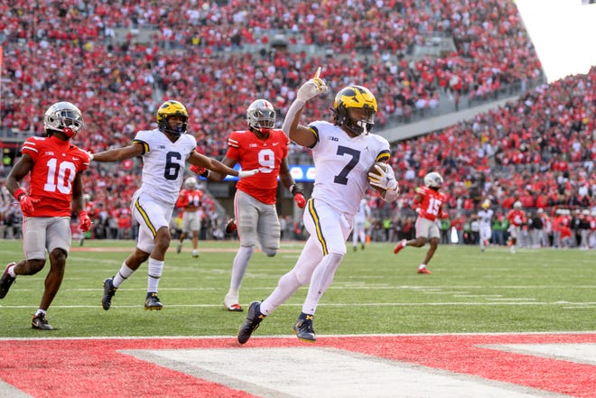 Michigan running back Donovan Edwards runs into the end zone for a touchdown late during the fourth quarter against Ohio State at Ohio Stadium in Columbus, Ohio, on Saturday, Nov. 26, 2022.