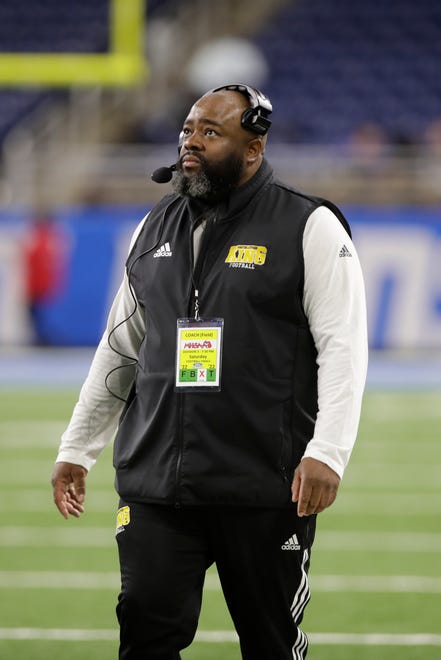 Detroit Martin Luther King head coach Tyrone Spencer looks on during the second half of the division 3 championship game against Muskegeon Saturday at Ford Field.
