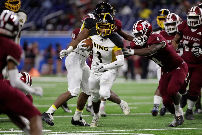 Detroit Martin Luther King senior running back Sterling Anderson Jr. runs the ball during the second half of the division 3 championship game against Muskegeon Saturday at Ford Field. Photo by: Brian Sevald / Special to the Detroit News