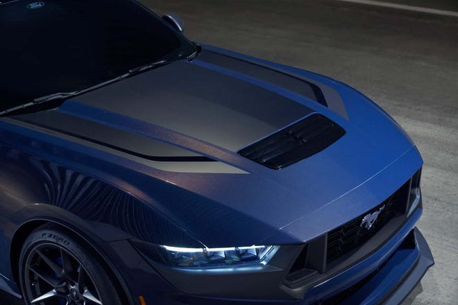 The 2024 Ford Mustang Dark Horse boasts a unique fascia, blue hue, and 500 horsepower.